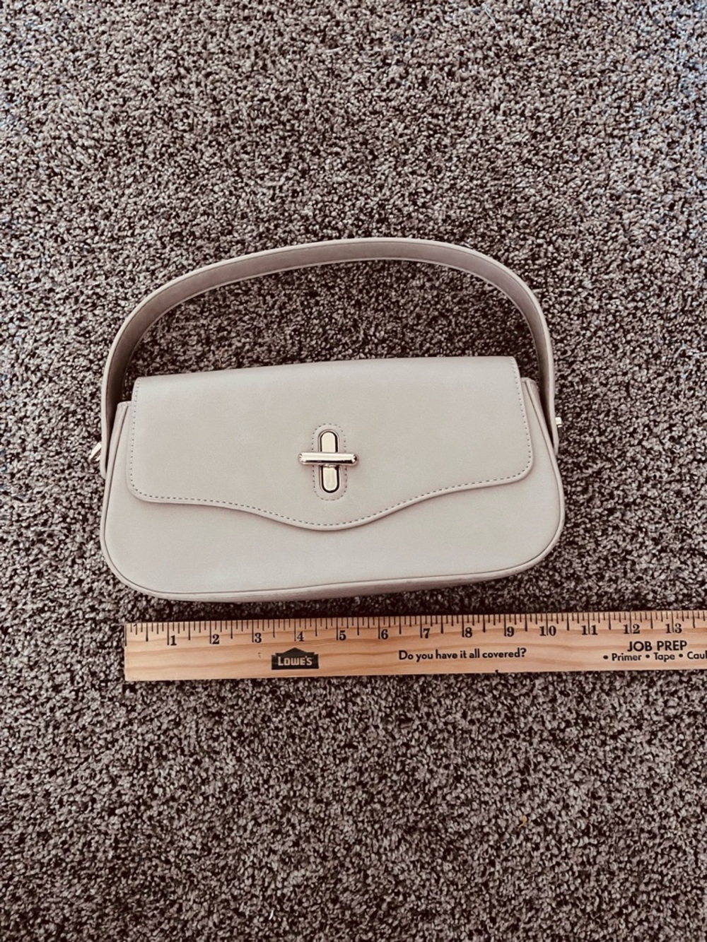Minimalist Beige Bag with Turn-Lock Accent